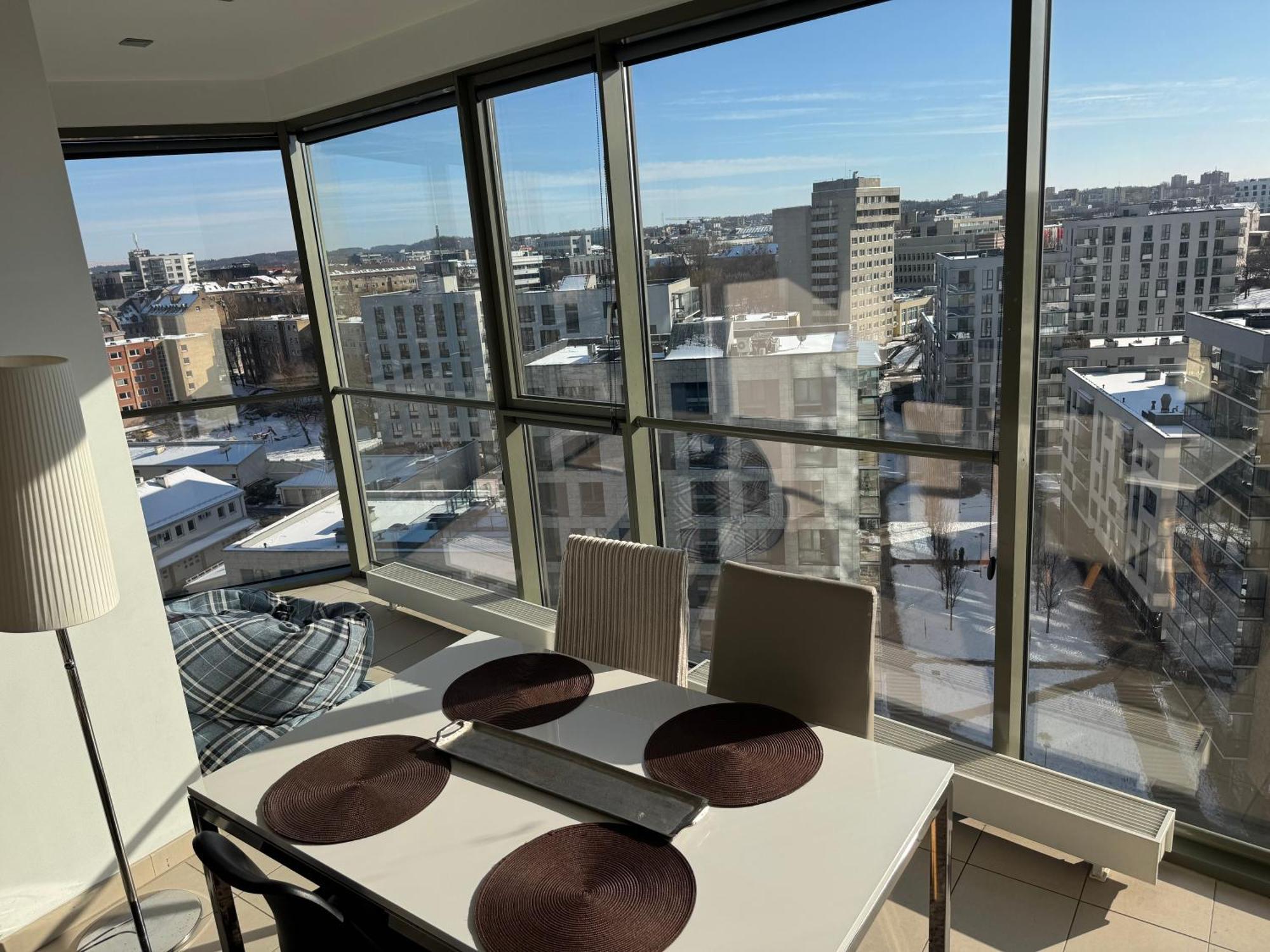 Helios Luxury Apartment In Vilnius Skyscraper Bagian luar foto